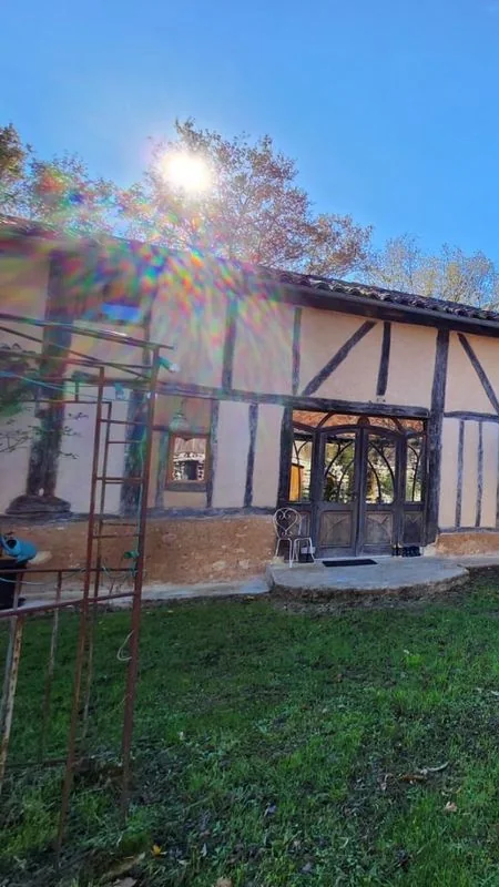 Front entrance of the main house in sunlight